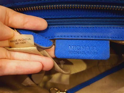 real vs fake michael kors bag|michael kors serial number checker.